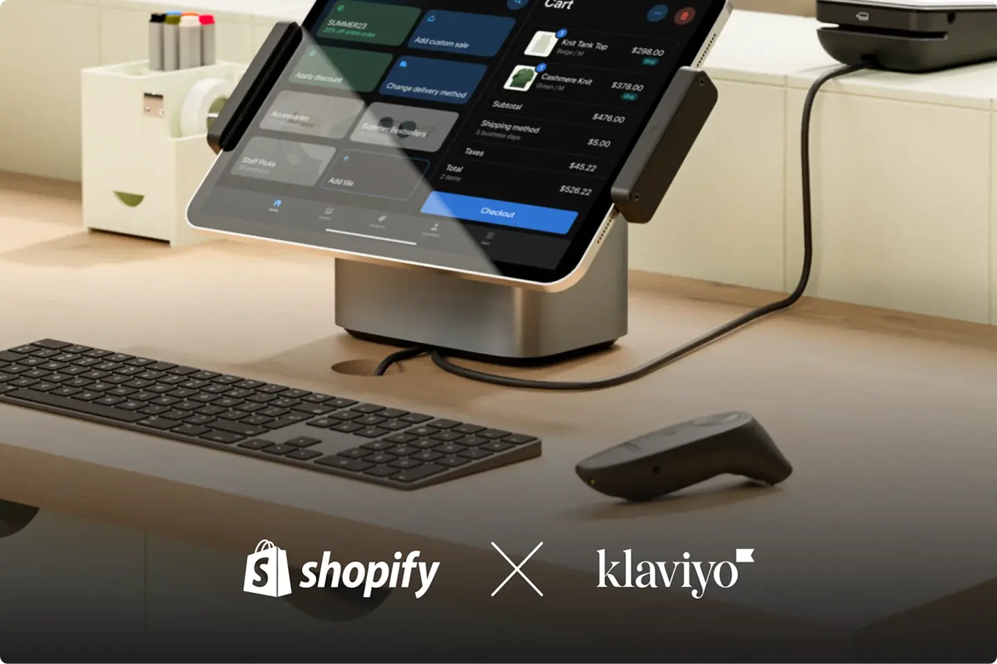 Klaviyo x Shopify on a background image of a retail store tablet register